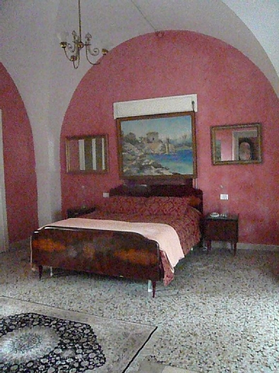 Red guest suite bedroom